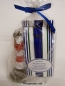 Preview: Geschenkset "Leuchtturm Roter Sand Blinklicht ca.15cm Poly mit 50 g. Früchtetee "Pratenschatz" in Cellophantüte"