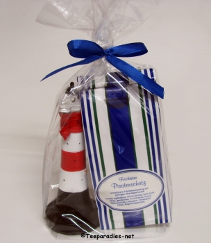 Geschenkset "Leuchtturm Roter Sand Blinklicht ca.15cm Poly mit 50 g. Früchtetee "Pratenschatz" in Cellophantüte"